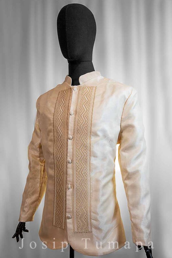 Photo of a Barong Tagalog in classic style with ethnic-style ivory embroidery by designer Josip Tumapa