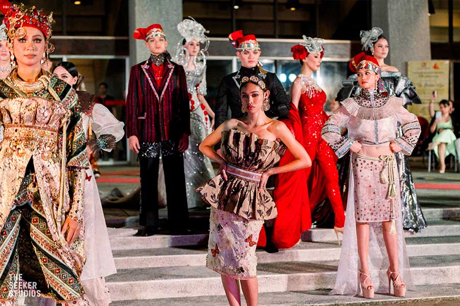 Erica Cadayday, Miss Negros Oriental 2024, in an ornate gown with models showcasing Amir Sali’s designs