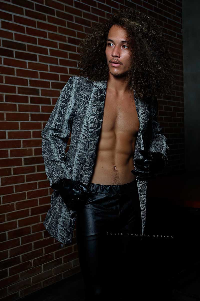 Evening menswear jacket worn open with emphasis on a clear vertical front line