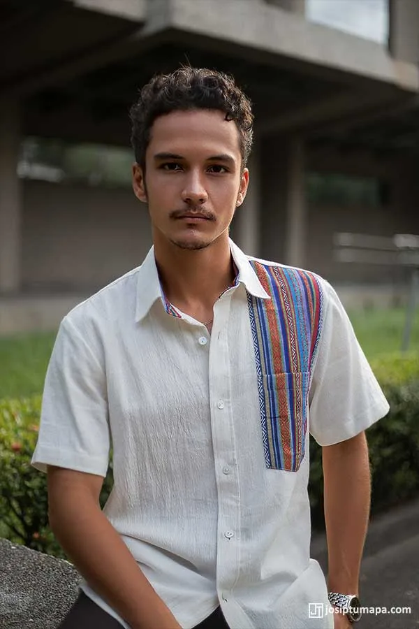 Close-up of a white short-sleeve shirt with tribal stripe detail