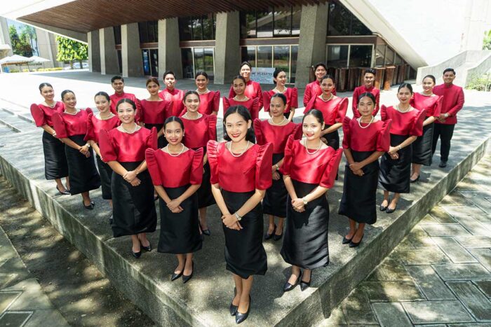 Staff in Filipiniana uniforms and modern Barong Tagalog at Luce Auditorium, Silliman University, Dumaguete