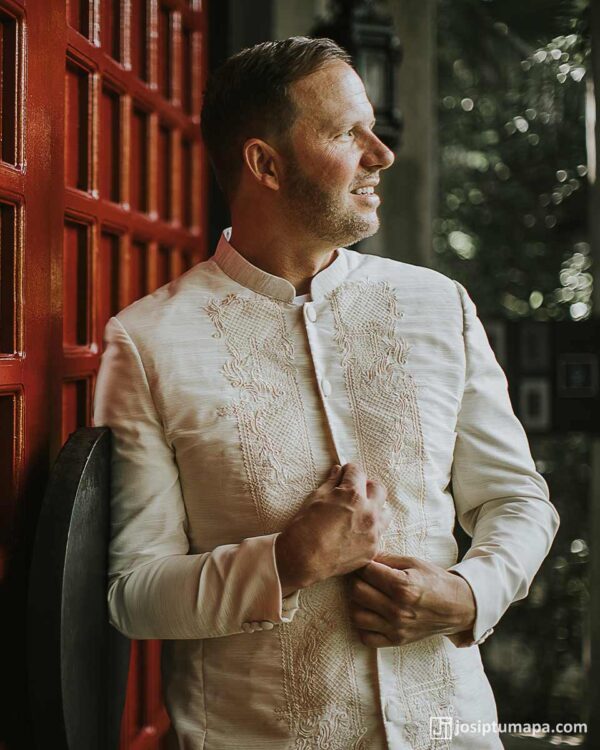 Groom in hand-embroidered Piña Cocoon Silk Barong Tagalog crafted by Filipino artisans for a modern wedding look