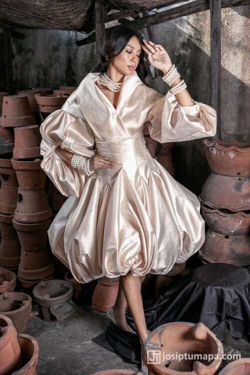 Modern Maria Clara dress with sculpted panuelo and voluminous sleeves in soft champagne satin, shown in a full-standing pose