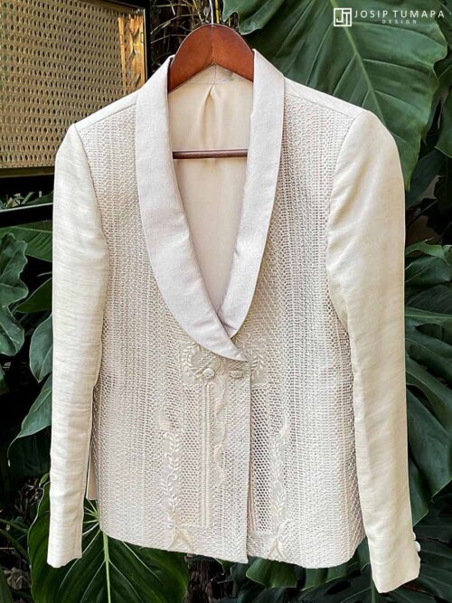 Formal Coat Barong in Piña Cocoon Silk with Calado Coat Barong in piña cocoon silk with added natural piña, calado openwork, and botanical embroidery on the front panel