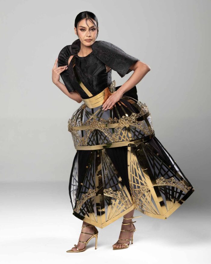 Filipiniana terno with reflective skirt panels used for a Miss Universe Philippines candidate photoshoot
