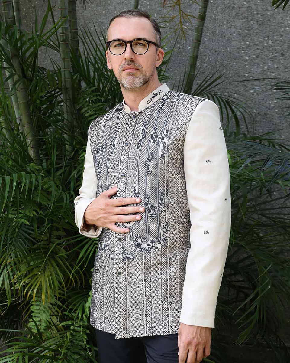 Custom Barong Tagalog with black embroidery and cream sleeves
