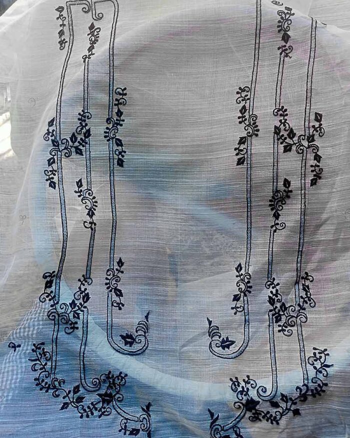 Custom Barong Embroidery Layout Partially completed black ornament on piña silk fabric