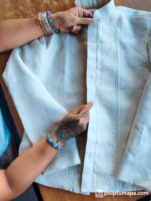 Custom Barong Tagalog Quality and Finish Check Checking the construction and finish of a custom Barong Tagalog